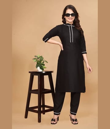 Nirja Fab Rayon Self Design Kurti With Pants Women's Stitched Salwar Suit - Black ( Pack of 1 )