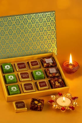Ghasitaram's Raksha Bandhan Assorted Bites Mithai Hamper with Rakhi, Roli, Chawal and Chandan,12 pcs Ghasitaram's Raksha Bandhan Assorted Bites Mithai Hamper with Rakhi, Roli, Chawal and Chandan,12 pcs