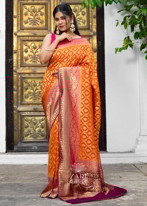 Charulata: Khaddi Georgette Handloom Banarasi Saree In The Shades Of Orange