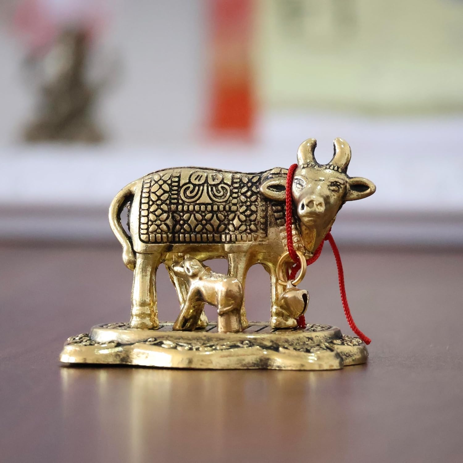 Dreamkraft Kamdhenu Cow with Calf Idol | Golden Metal Handicraft Showpiece for Home Decor, Mandir, Pooja Room, Gift Article for Vastu, Office Table, Diwali, Housewarming & Anniversary