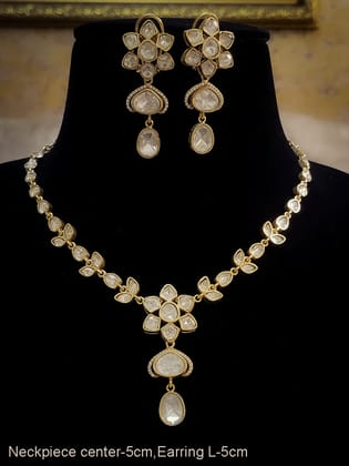 Uncut polki flower center with coloured triangular stone surrounded by AD drop set-White