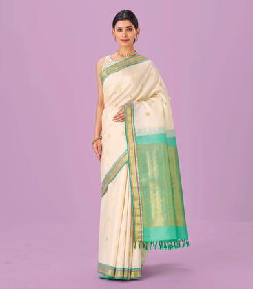 Cream Handloom Kanchipuram Silk Saree With Zari Buttas & Contrast Border-Cream