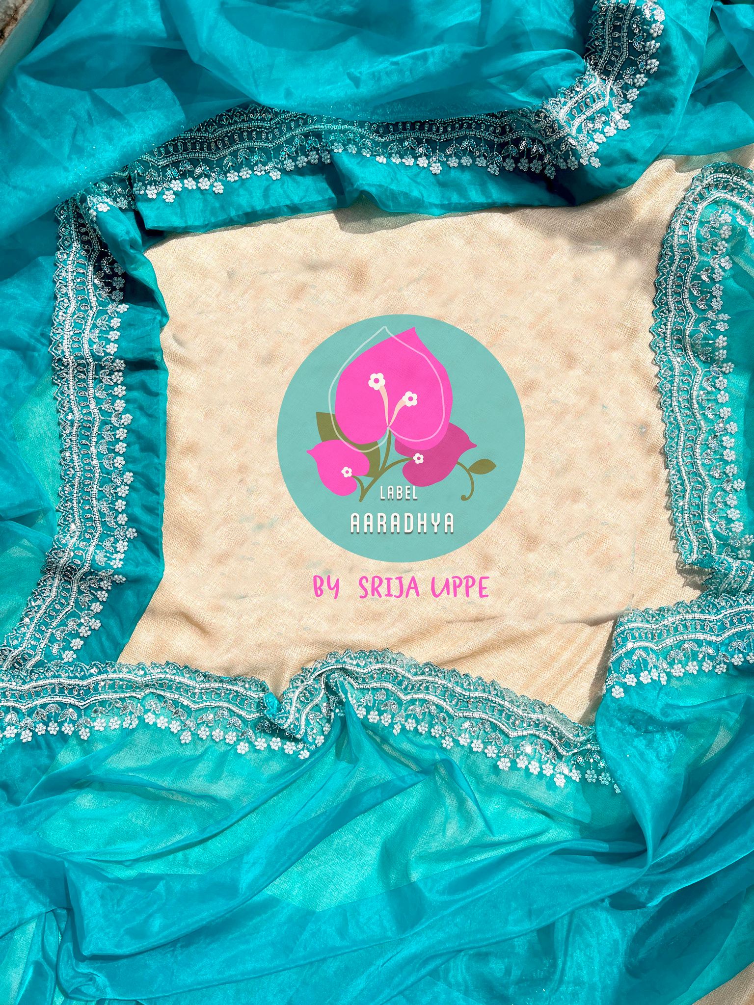 Soft organza silk hand embroidered saree in Peacock green