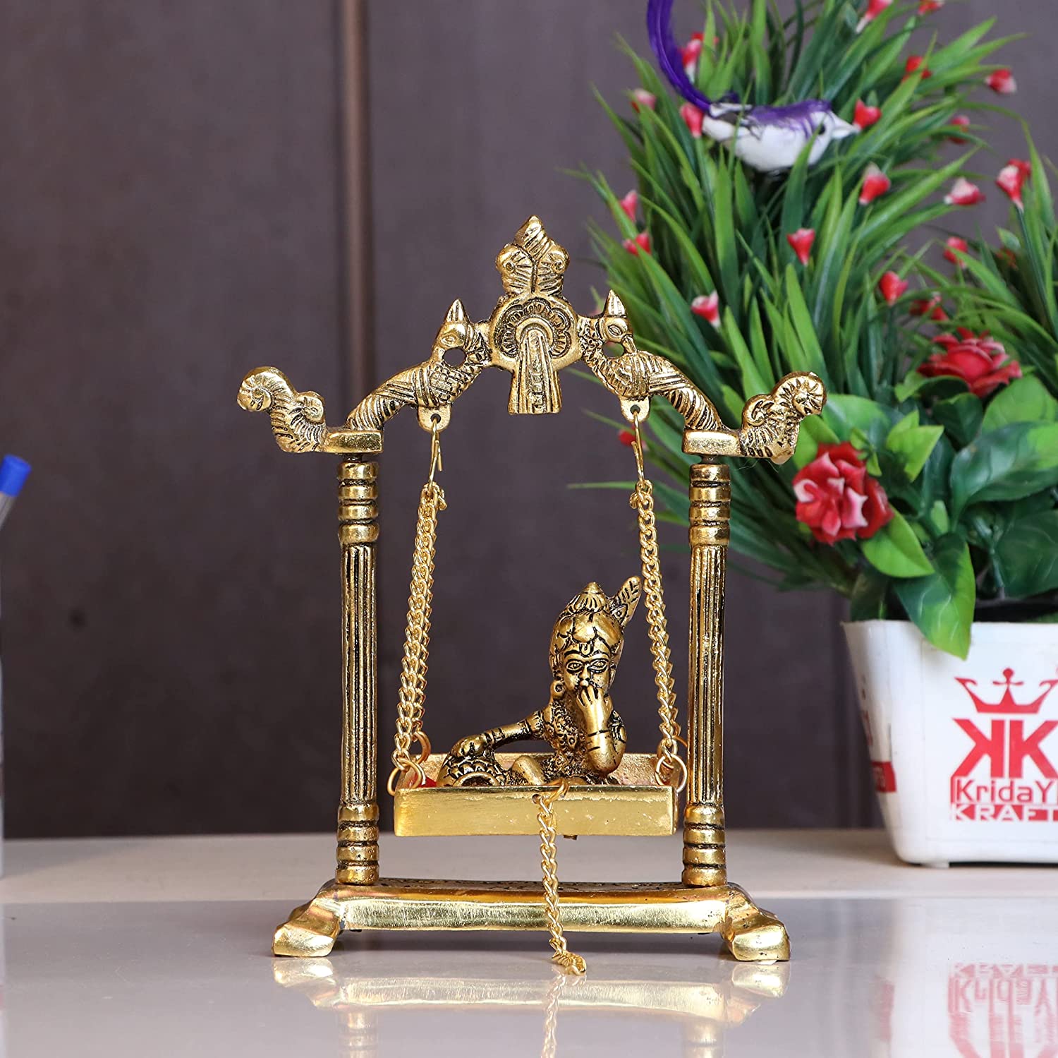 DreamKraft Laddu Gopal on Jhulla Palana Metal Statue Gold Plated