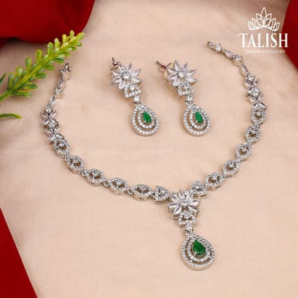 Elegant Silver-Plated Necklace Set with American Diamond Stones and Green Teardrop Accents