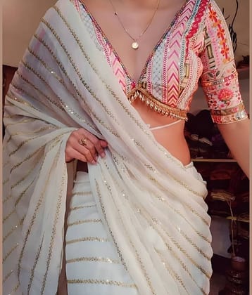 Apnisha Georgette Embroidered Saree With Unstitched Blouse Piece ( White )