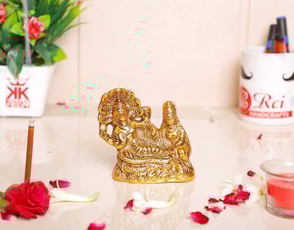 DreamKraft Metal Gold Plated Laxmi Narayan on Sheshnag Showpiece Figurines (Golden, Standard size)
