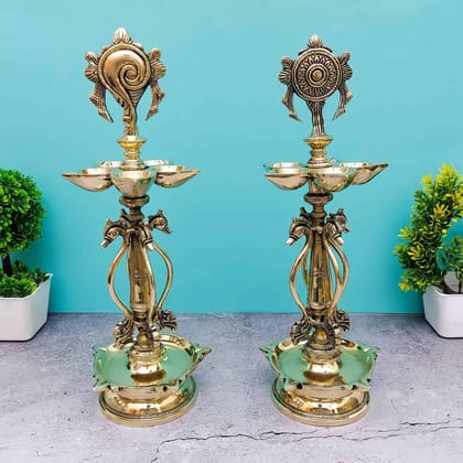 Brass Shankhchakra Lamps Set - 15.5 inch Height | Sacred Brass Shankhchakra Lamps for Pujas Brass Shankhchakra Lamps Set - 15.5 inch Height | Sacred Brass Shankhchakra Lamps for Pujas