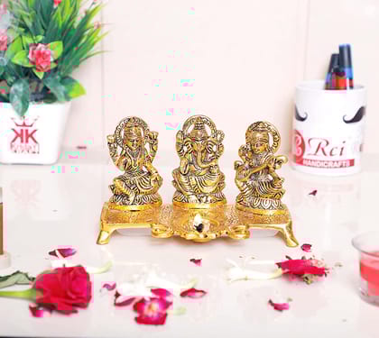 DreamKraft Laxmi Ganesh Saraswati Metal Idol Decorative Platter with Diya (Gold) DreamKraft Laxmi Ganesh Saraswati Metal Idol Decorative Platter with Diya (Gold)