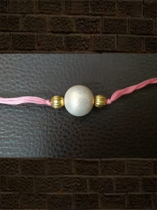 Light pink thread pearl bead rakhi