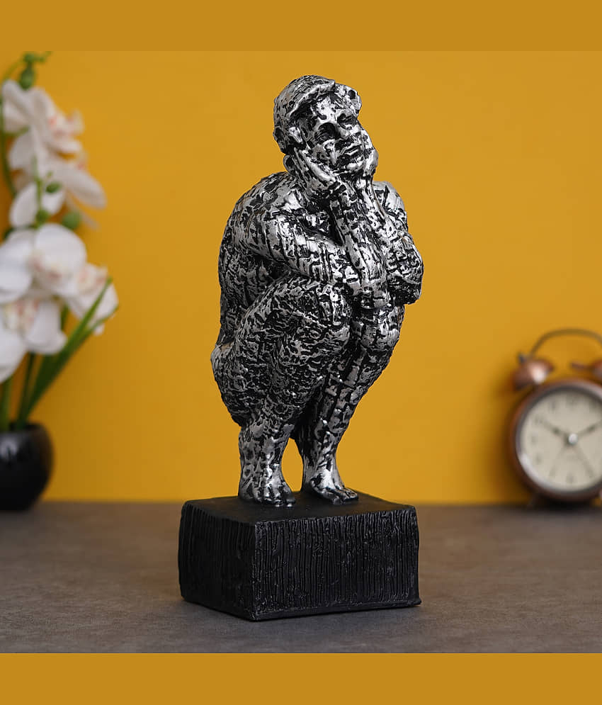 eCraftIndia Silver-Toned Textured Man Sitting & Thinking Human Figurine Showpieces