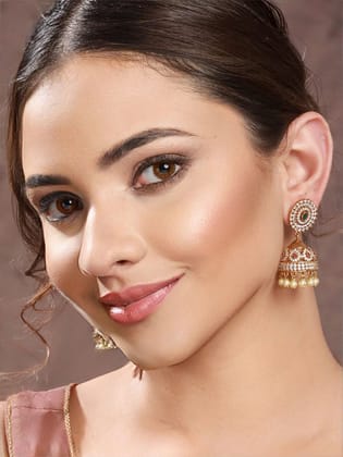 Gold Plated Green CZ Studded Pearl Beaded Jhumka earrings Gold Plated Green CZ Studded Pearl Beaded Jhumka earrings
