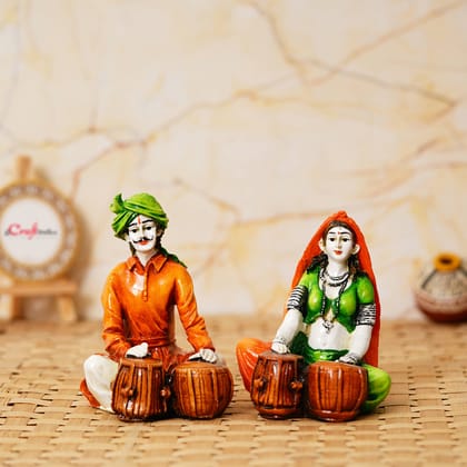 Colorful Combo of Rajasthani Craftsmen and Lady Playing a Musical Instrument Statue