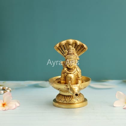 Brass Shiva on the Lingam with Removable Five Faced Adhishesha Snake - 5 inch height Brass Shiva on the Lingam with Removable Five Faced Adhishesha Snake - 5 inch height
