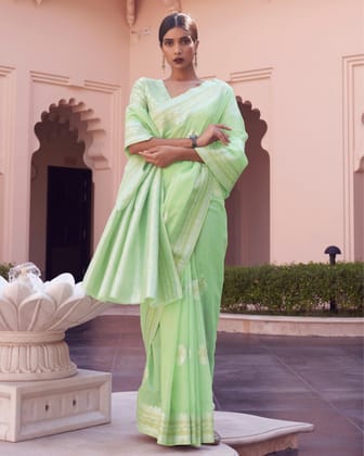 Gunja Kavuni Silk Linen Pista Green Saree