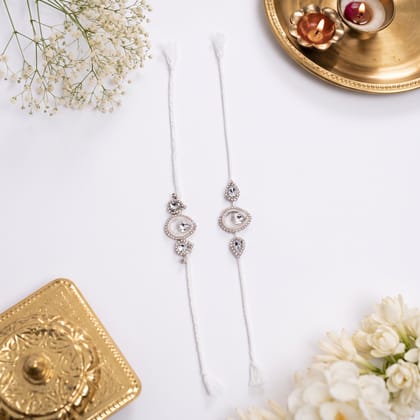 PREMIUM WHITE CRYSTAL EMBELLISHED RAKHI SET PREMIUM WHITE CRYSTAL EMBELLISHED RAKHI SET