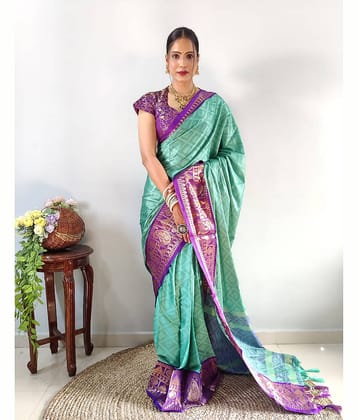 Apnisha Banarasi Silk Embellished Saree With Unstitched Blouse Piece ( Pink )