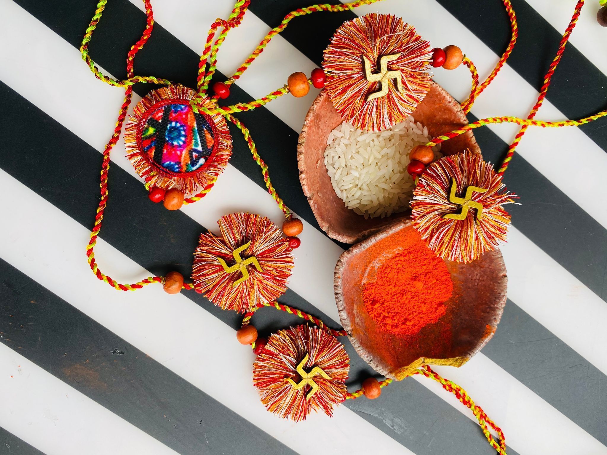 A bright day Swastik Rakhi - 1 piece