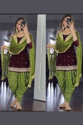 Partywear dhoti patiyala suit and dupataa set.