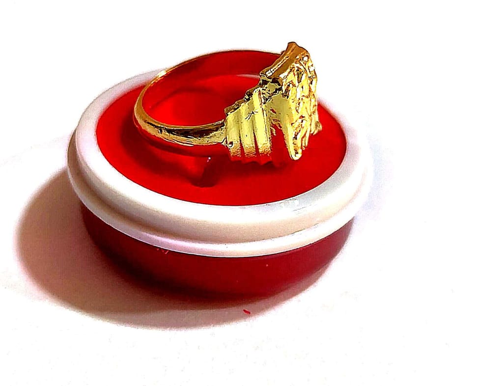 "Golden Ring with Intricate Design"