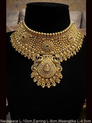 Laxmiji motif in leaf design center with peacock sides broad choker set with intricate paisley work-Ruby green