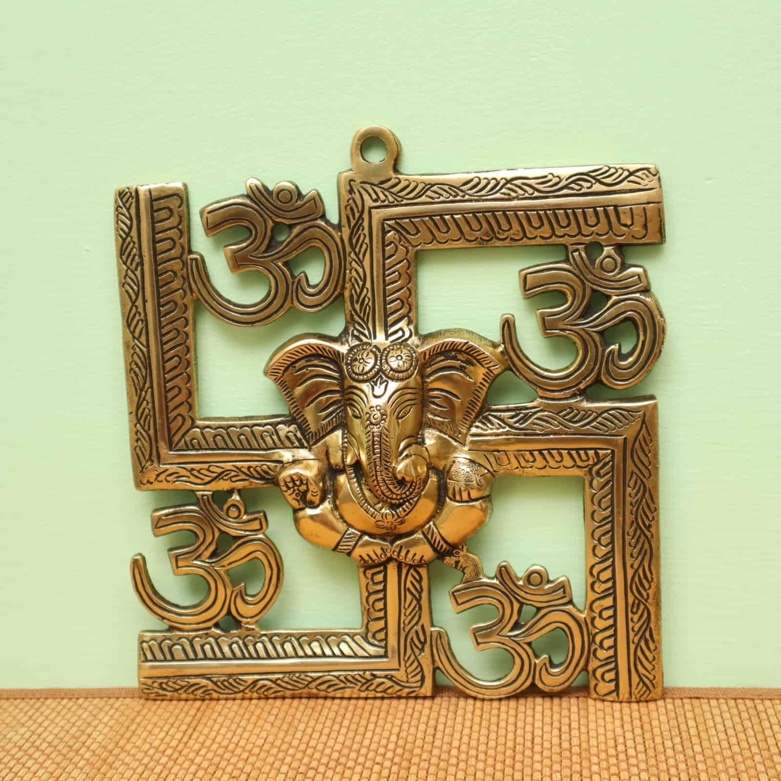Brass Ganesha Om Swastik Wall Decor - 8.5 inch Height | Sacred Brass Wall Hanging with Ganesha, Om, and Swastik