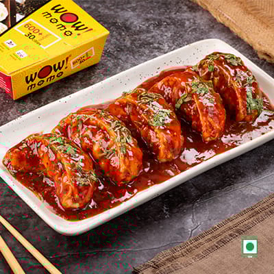 Veg Hot Garlic Pan Fried Momo In Schezwan Sauce (Spicy)