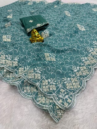 Soft cotton simmer silk print saree with heavy c-pallu seqance zari work with butti in whole saree & cut work border Soft cotton simmer silk print saree with heavy c-pallu seqance zari work with butti in whole saree & cut work border