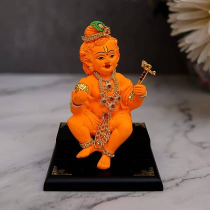 Craftlayout Resin Laddu Gopal Orange Finish Car Dashboard - 5 Inch