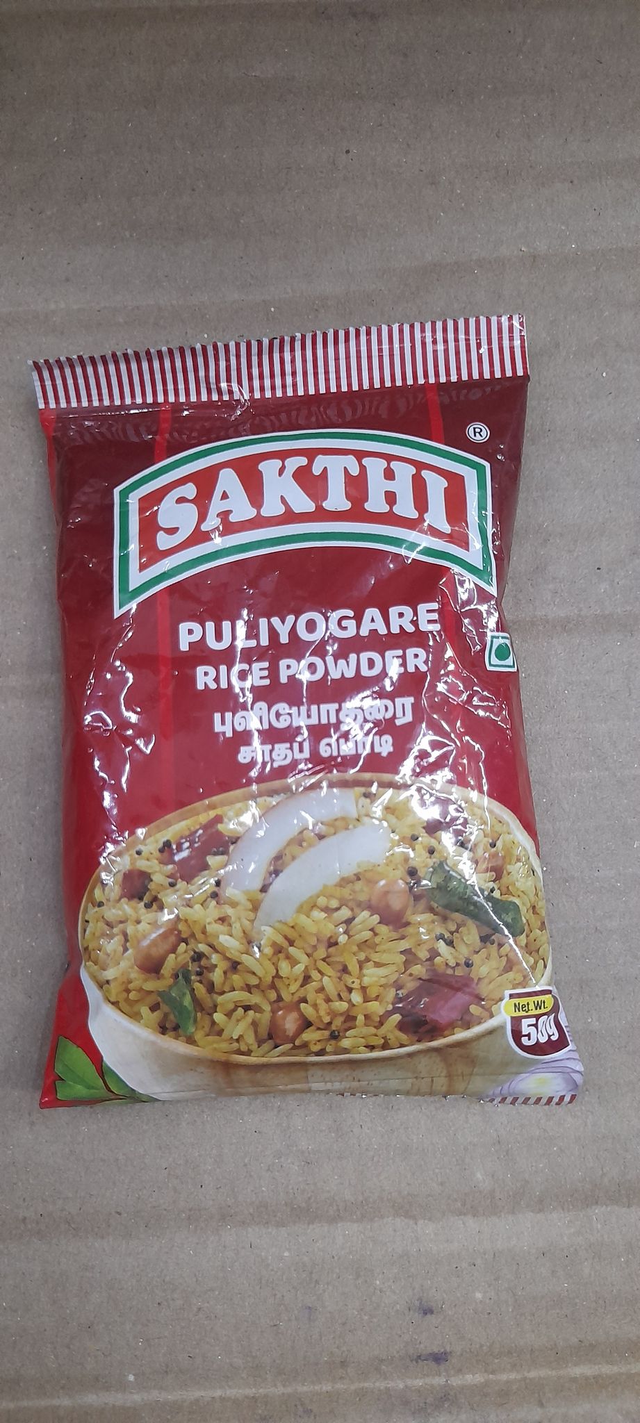 Sakthi puliyogare rice powder
