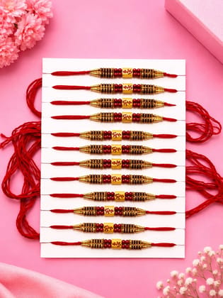 Celebrate Raksha Bandhan with this elegant set of 12 lotus design rakhis. Featuring pearl-like beads, yellow accents, and red-yellow threads for a festive traditional look.