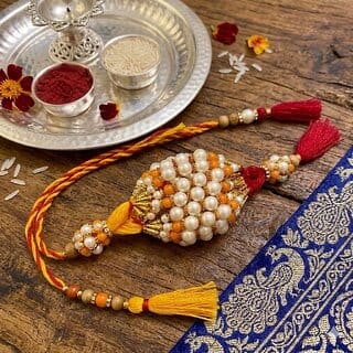 (Pack of 12) CHARKEE Fancy 12 Bhaiya Bhabhi Rakhi (Multicolour)