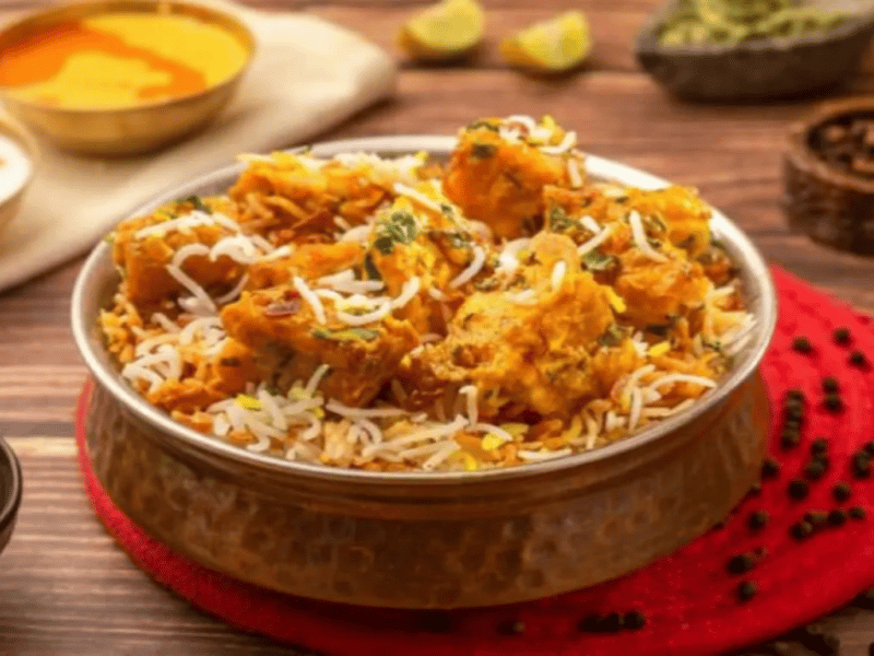 Paneer Tikka Hyderabadi Biryani (With Raita)