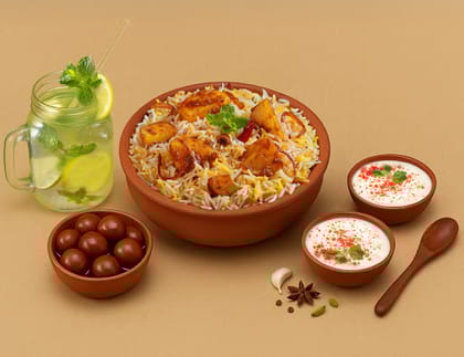 1 KG Tandoori Aloo Biryani + Dessert + Thums Up + 2 Raitas