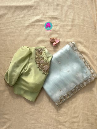 We call it a cocktail soft tissue silk saree with a flowy drape, paired with a Peter Pan collar blouse in matching tissue-2XS