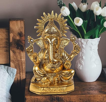 DreamKraft Metal Lord Ganesha Statue Sitting On Chowki Collectible Feng Shui Figurine (8 Inch, Gold)