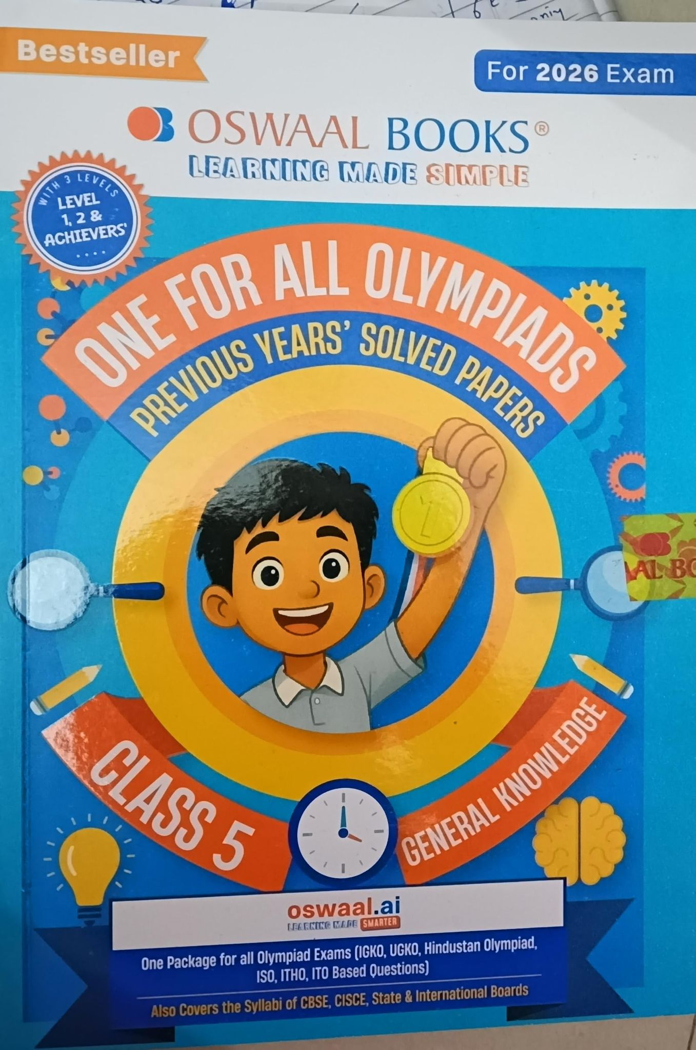 Oswaal One For All Olympiads Previous year class 5 Paper Solved Paper General Knowledge GK 2026 Exams ONE PACKAGE FOR ALL olympiads exams