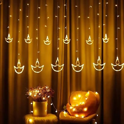 Warm White Diya/Diwali Light Curtain, Led String Copper Lights with Pack of 12 Hanging Diyas, 8 Flashing Modes, Decoration, Prong Base
