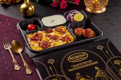 Dum Gosht Biryani Thali With Kebabs.