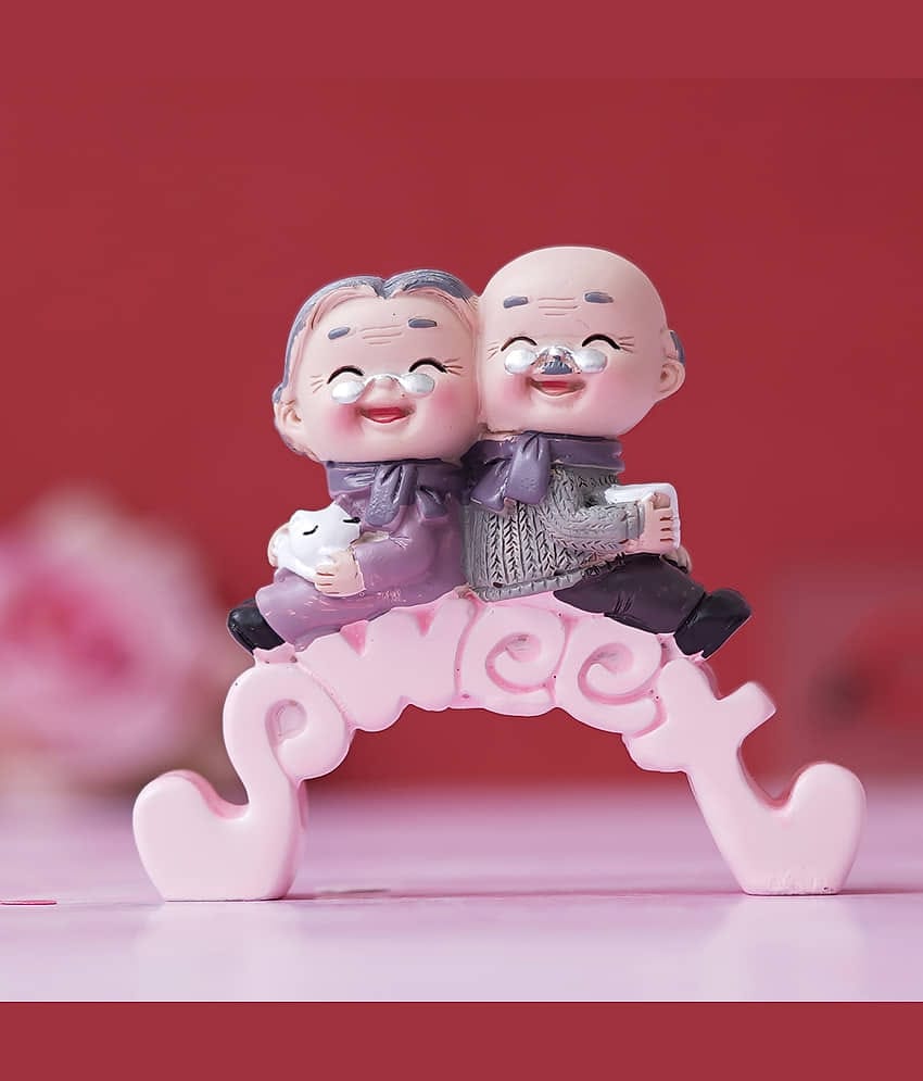 eCraftIndia Multicolor Resin Couple Figurine