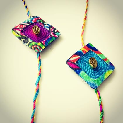 Golden embellishment Rakhi pair