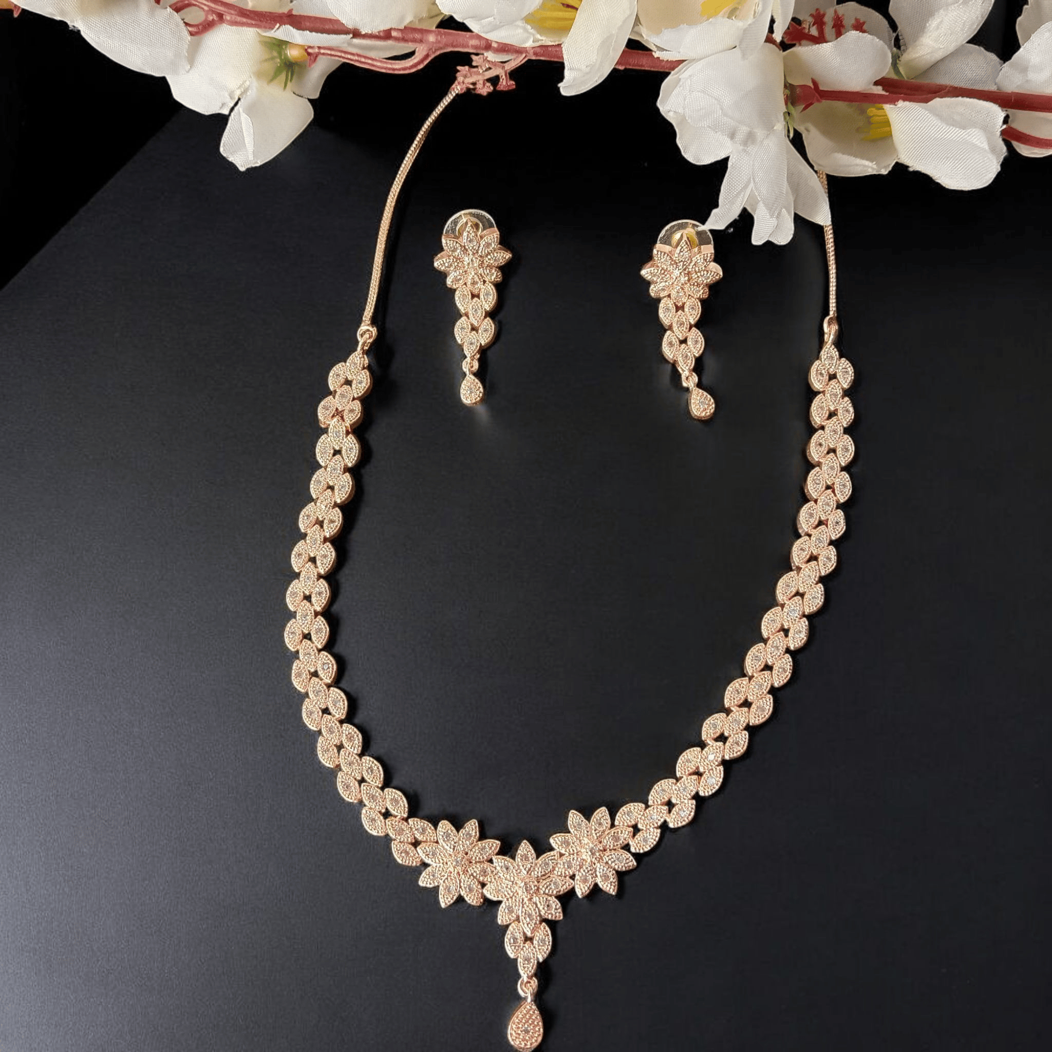 ELLNORA'S "Stunning American Diamond Necklace Set in Gold Plating with Floral Motif for Women"