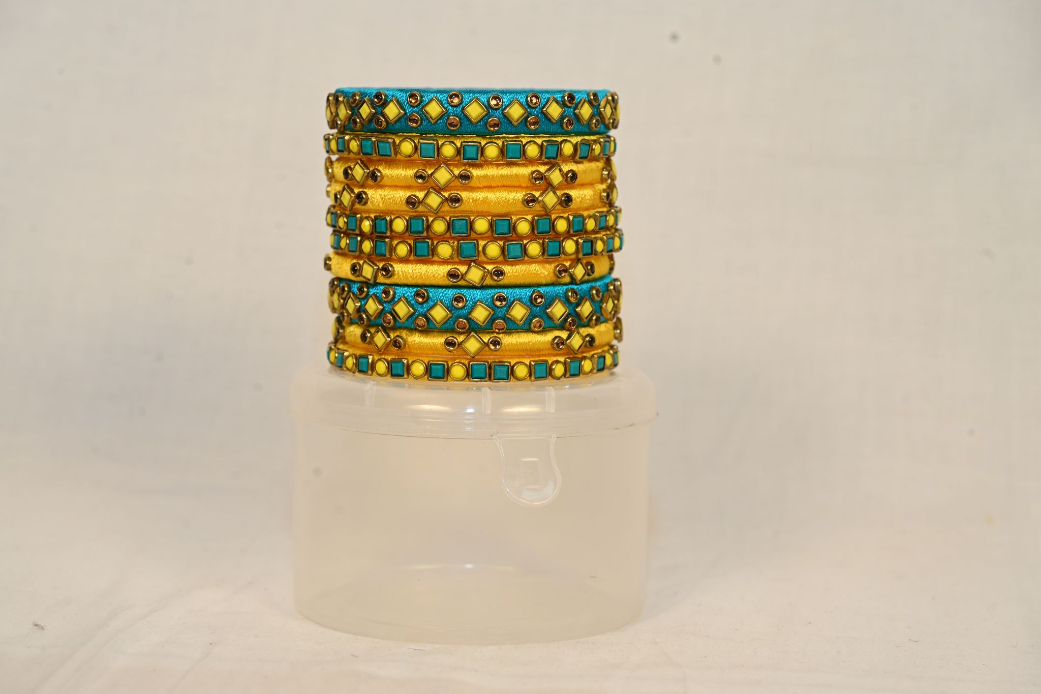 Yellow and Green Kundan Silk Thread Bangles