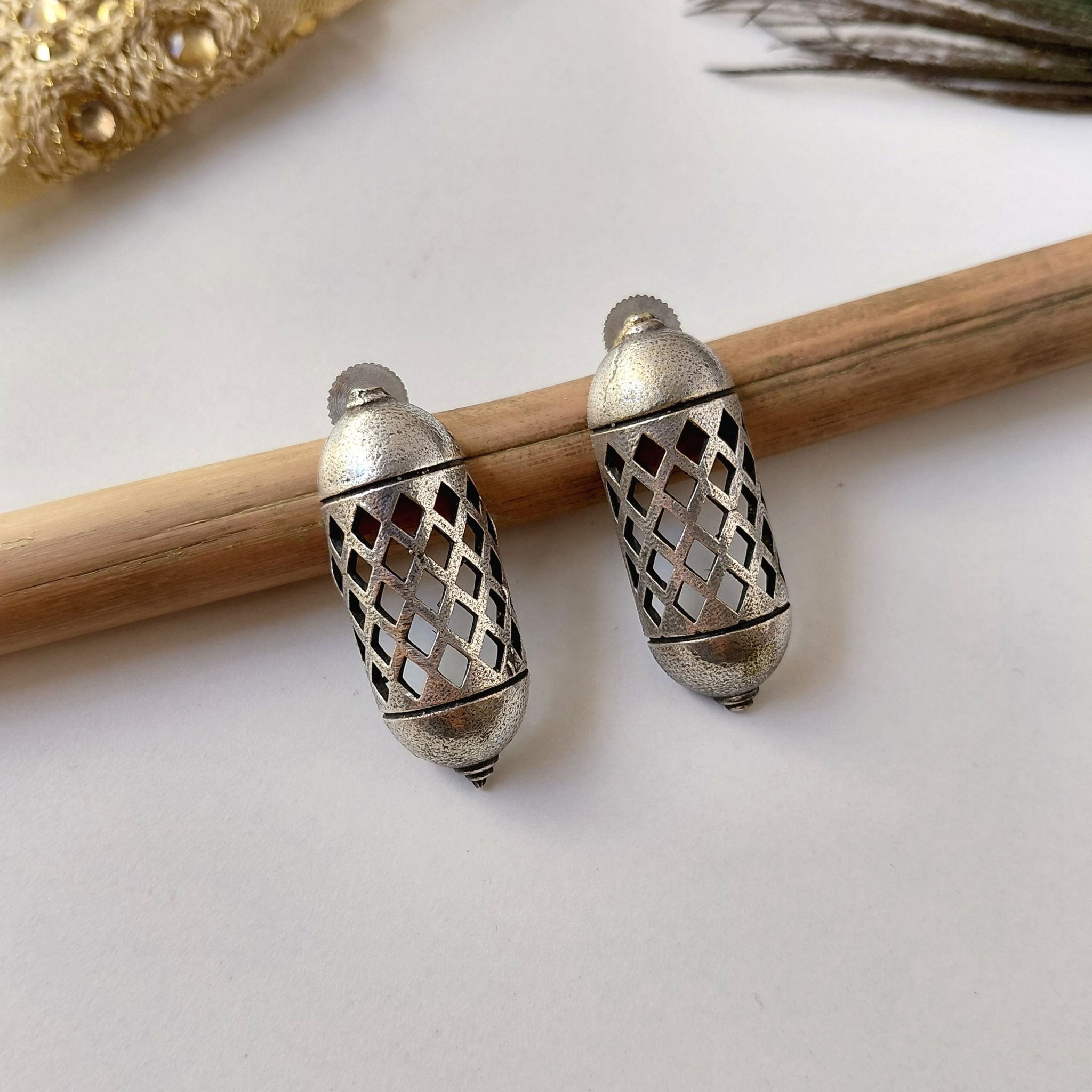 Trendy Silver Look Alike Oxidised Jali Pattern Stud Earrings For Women Casual And Ethnic Earrings Under 150
