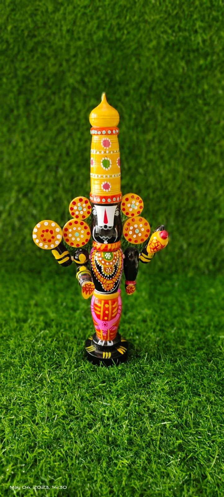 Handcrafted Wooden Deity Figurine - Intricate Design