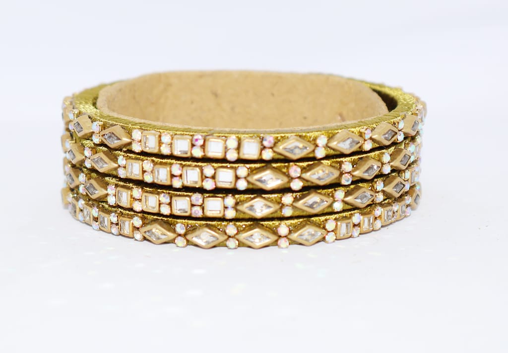 Elegant Gold Bangles with Sparkling Embellishments