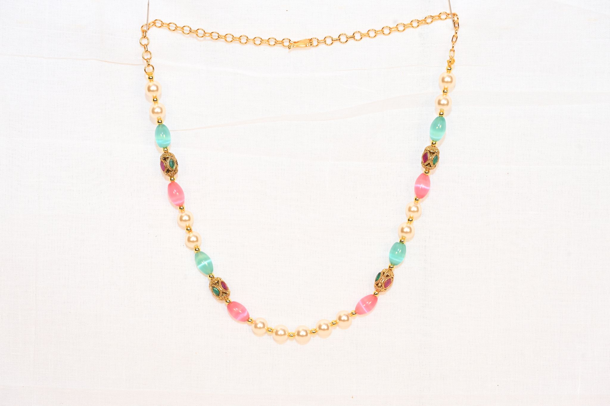 Gold-toned and pink necklace