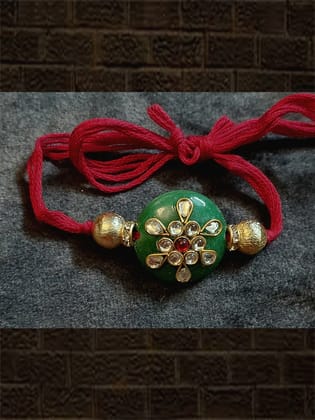 Green round bead kundan work with side gold beads rakhi