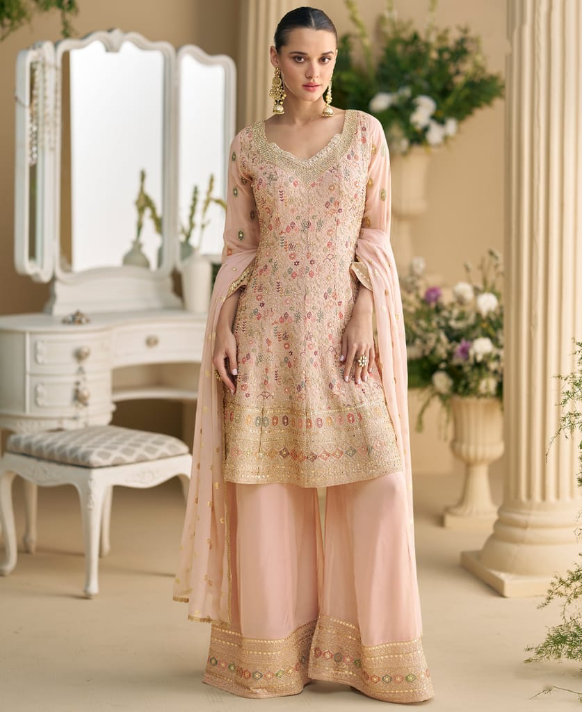 heavy wedding wear pink georgette peplum style suit for women