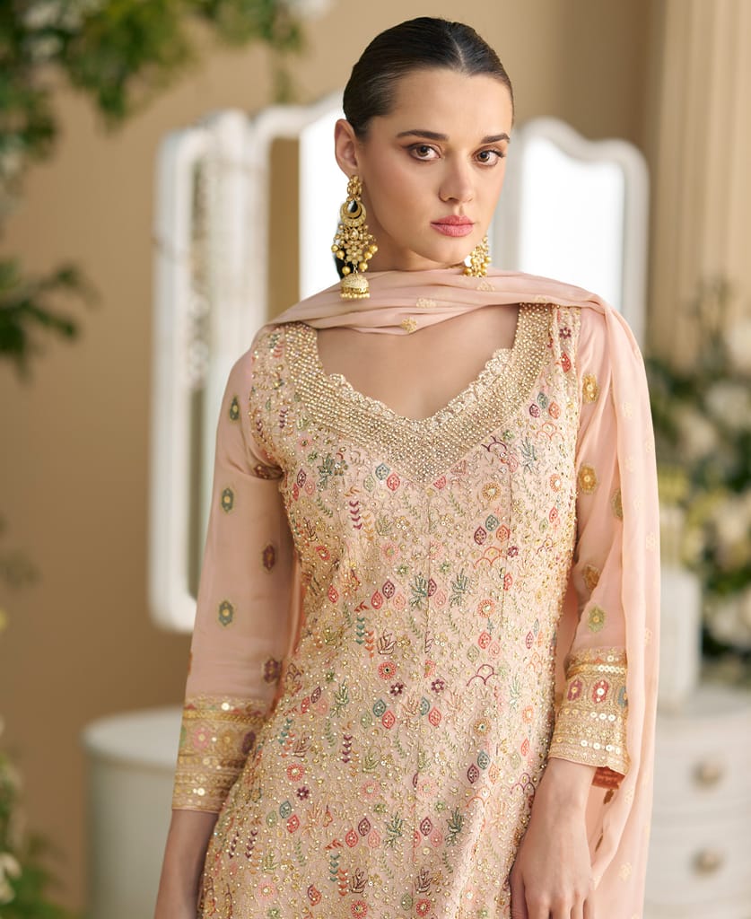 heavy wedding wear pink georgette peplum style suit for women